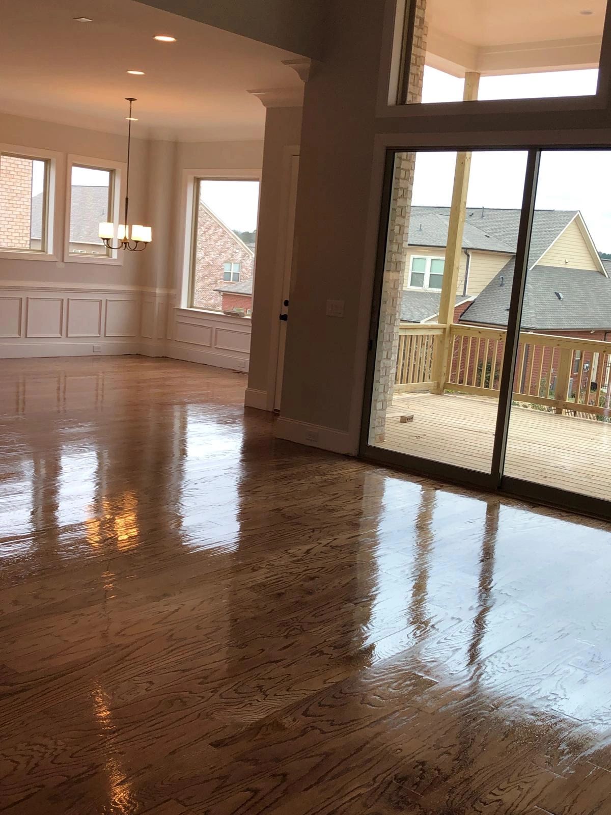 Open-concept living area with hardwood floors